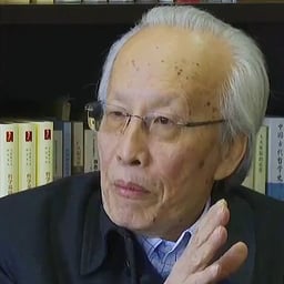 孙正聿（红色背景老头）